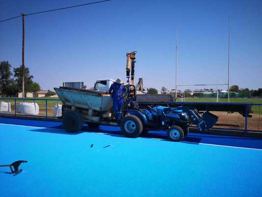 FIH Certified Hockey Artificial Turf with 14mm Pile Height and Water Spray for Consistent Play
